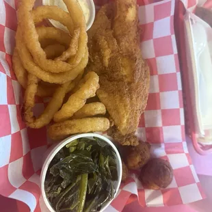 Flounder with onion rings, collards, and hush puppies