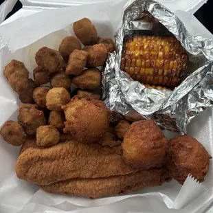 Fried catfish, okra, corn and hush puppies
