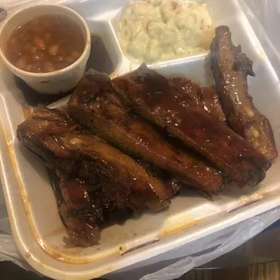 My mom loves it and so do I! Smoked rib plate with side of baked beans and potato salad.