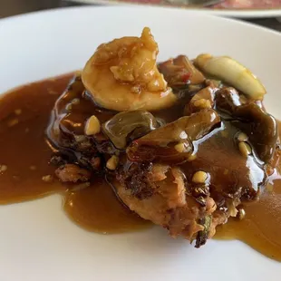 Another view of egg foo young with sauce