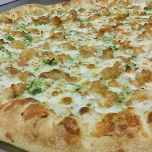 Chicken broccoli Alfredo pizza, favorite place to eat!