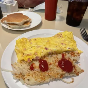 an omelet and pancakes