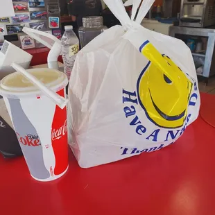 a plastic bag with a smiley face on it