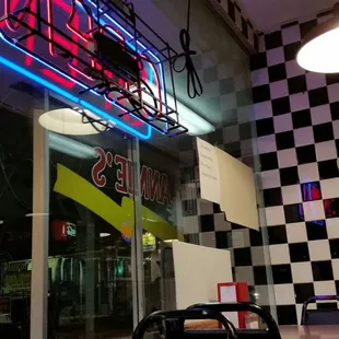 This should give you an idea of the aesthetic they were going for. Interior feels like you walked back in time.