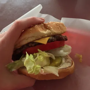 Came hangry and left happy. Bun was perfectly buttered and toasted on this Deluxe Cheeseburger quarter-pounder.