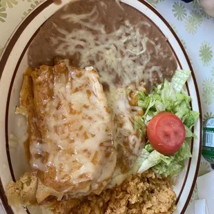 Tamale and enchilada plate.