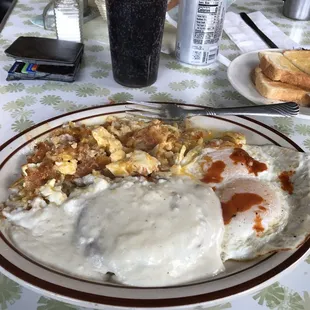 Chicken fried steak. 2 eggs over easy. Hash browns extra crispy with 2 extra eggs over easy mashed in by me.