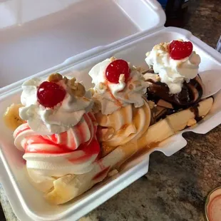 a banana split in a styrofoam container