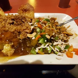 Chicken Chow Mien, egg Foo young, fried rice and cream cheese wontons.