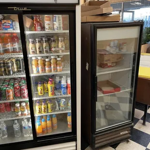 two refrigerators in a store
