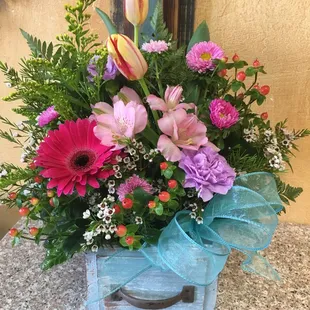 Cute keepsake box with a beautiful blend of spring flowers