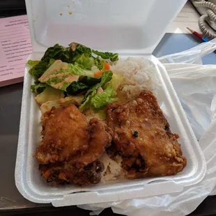 Garlic fried chicken, rice and greens