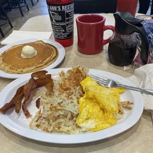 Breakfast. Eggs, bacon, hash browns, pancakes and coffee for $11.99. Fantastic deal!