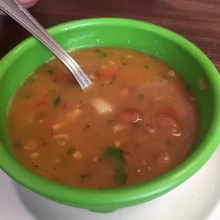 a bowl of soup on a plate