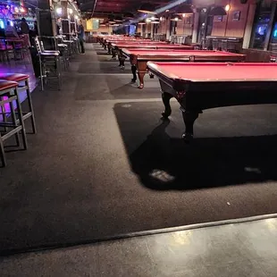 a pool table in the middle of a room