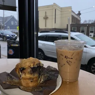 Blueberry muffin and iced chai latte with almond milk