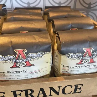 a crate of coffee roasters