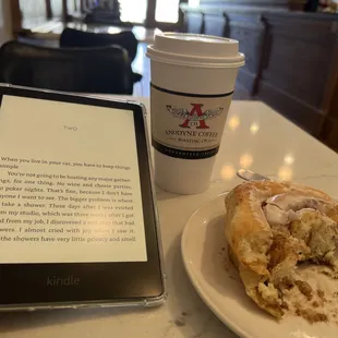 a tablet and a pastry