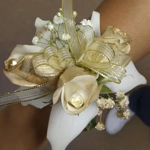 Gold rose and orchid corsage