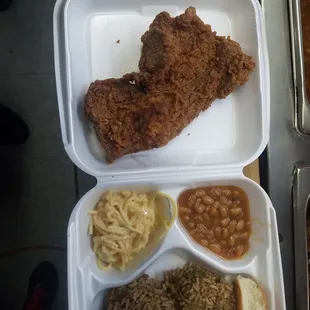 a meal in a styrofoam container
