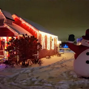 Holiday in Lights at the Anoka County Fair: the old schoolhouse and newer snowfriend