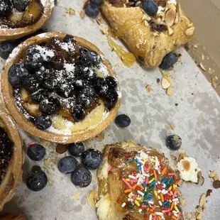 a variety of pastries in a box