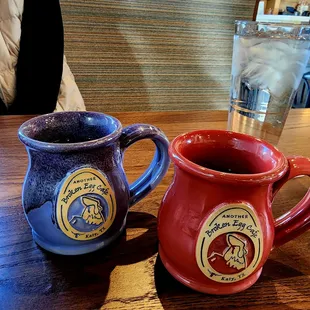 two mugs on a table