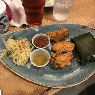 Sticky rice plate with fried chicken wings