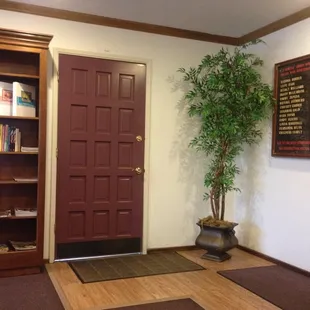 Front entrance with wall of recommendations