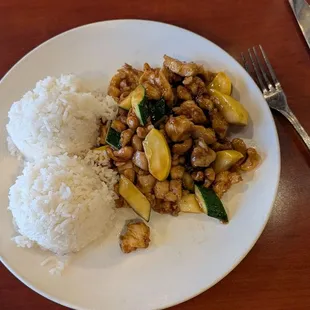 Cashew chicken with steamed rice.