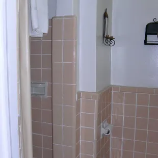 The bathrooms include a stand up tile shower