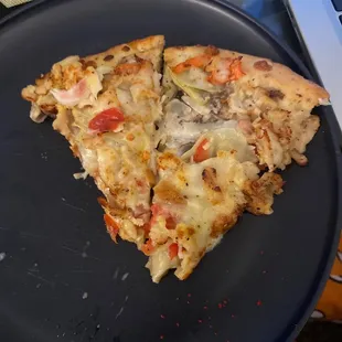 Roasted Garlic Chicken Specialty Pizza with artichoke.