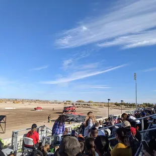 Phones out in the stands filming the monster trucks show