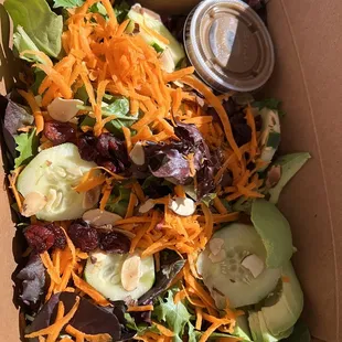 To go Salad.   Breakfast bowl with avocado and mixed greens. Vegan Biscuit.  Waffle.  Fantastic coffee.