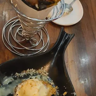 Pineapple Upside-down bread pudding in the skillet and the Hong Kong Waffle.