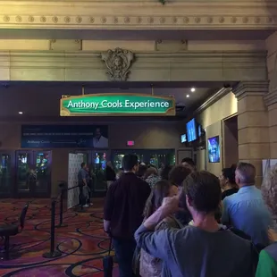 people waiting in line at an airport