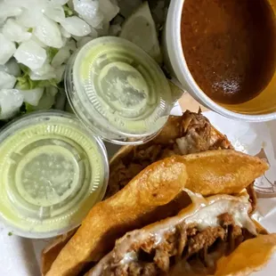 Two Birria tacos