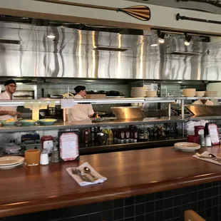 two chefs working in the kitchen