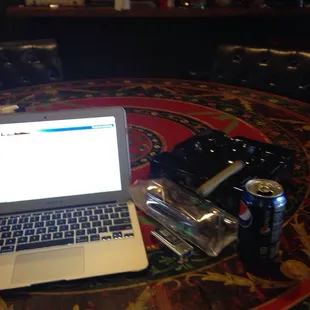 Wifi, a soda and a good smoke... Doing homework at the cigar shop while my oil is getting changed...#multitasking