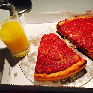Two pieces of meat Chicago deep dish pizza. It&apos;s awesome! The best Chicago style pizza that I have eaten in Ann Arbor.