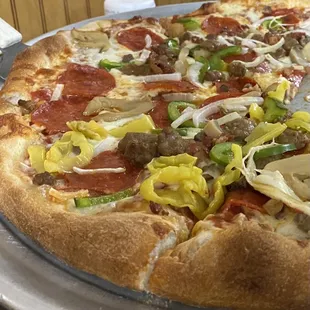 Super supreme half with banana peppers.