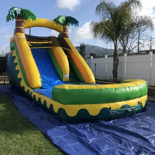 At the heat with one of our waterslides or obstacle course that can be turned into a wet course.