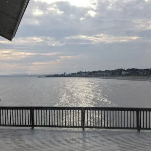 a view of the ocean from the deck