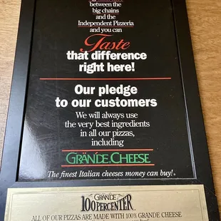 Sign in restaurant. This pizza does have the best cheese!!