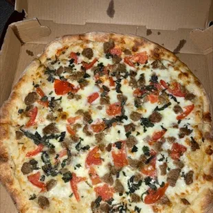 Margherita Pizza with sliced meatballs added.