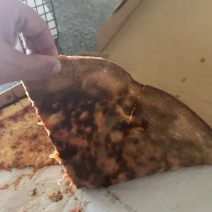 Burnt sausage pizza