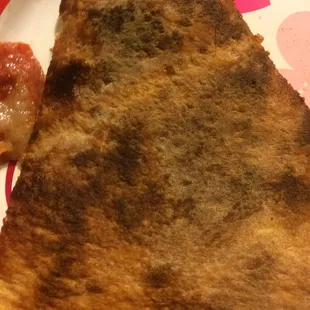 The entire bottom of pizza was BLACK!!