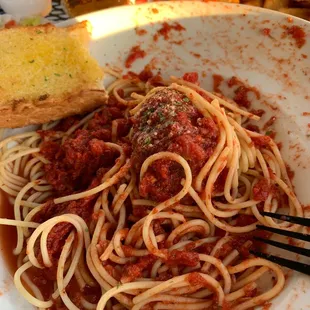 Spaghetti with marinara and meatballs I ate one already so delicious