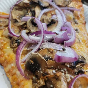 Loved pizza slice, mushroom and onion