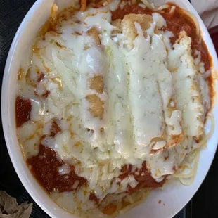 All that gooey cheese. It's placed in the oven and comes out piping hot.